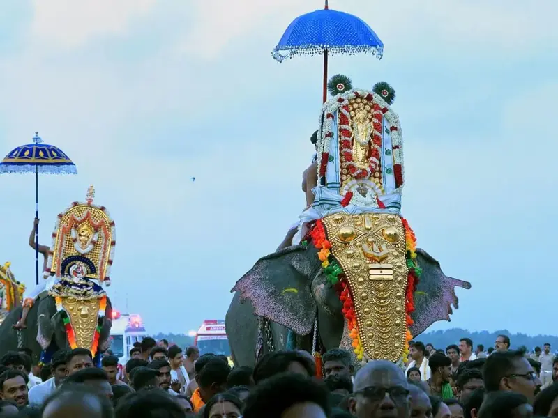 Airport Pauses for Temple Procession