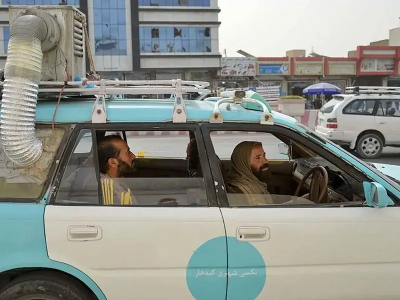 Afghan Taxi Drivers Beat the Heat